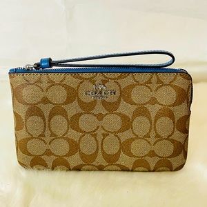NWT Coach large corner zip wristlet in Signature Canvas